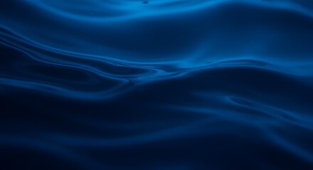 Obraz premium Deep blue water ripples with flowing, silken texture.
