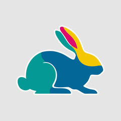 Abstract bunny silhouette decorated with vibrant watercolor splash art on white background
