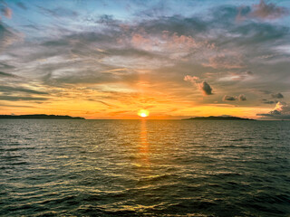 sunset view at dusk between Maniang Island and Padamarang Island