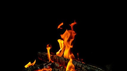 Camp Fire flames with sparks on a black background