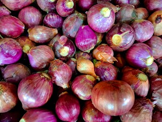 Fresh red onions for sale at the market