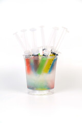 Various types of colorful cocktails on a white background