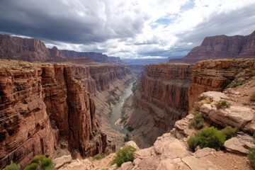Fototapeta premium Grand Canyon view of Colorado River with cloudy sky background, for tourism