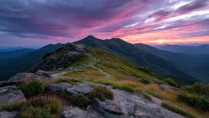 Mountain peak trail with cloudy dusk sky for outdoor travel landscape photo