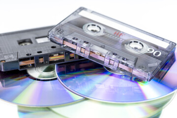 Retro Sounds of Time: A nostalgic collection of audio cassette tapes and compact discs, a vivid...