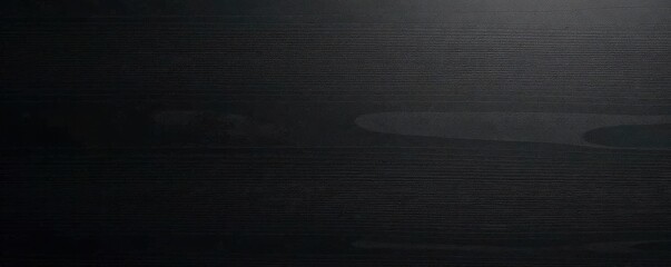 Obraz premium Smooth, matte black wood surface, fine grain visible, black texture, modern