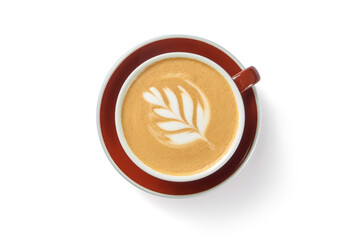 Tasty aromatic coffee cappuccino with foam in cup on red plate isolated