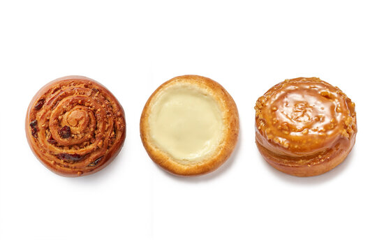 Raisin, cheesecake and peanut caramel bun isolated on white background