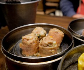 Bacon-wrapped dimsum in a Chinese restaurant in Baguio City.