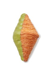Delicious freshly baked croissant covered with half pistachio cream on top