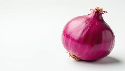 Single red onion, vibrant color, clean white backdrop, photography, root vegetable