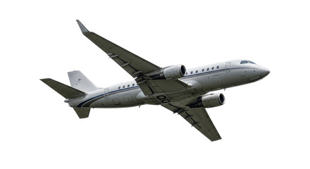 Obraz premium Isolated Private Jet Flying Against a White Sky for Luxury Travel