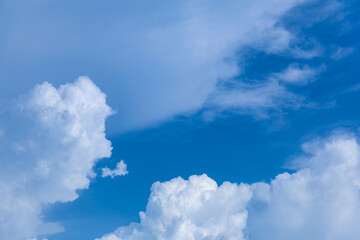 Blue Sky Filled with Fluffy White Clouds