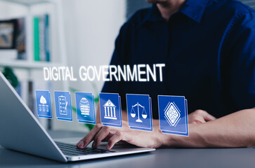 Digital government transformation and online public services. A person using laptop with digital...