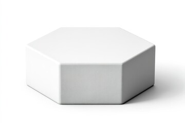 White hexagonal object placed on a clean surface with smooth edges and a minimalist design in contemporary style