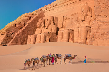A Group of tourist riding a camel - Abu Simbel Temple - Egypt, Africa