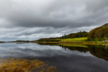 Dunvegan Castle overlooks the Isle of Skye’s coast, surrounded by manicured gardens, exotic plants and a small harbor. Historic interiors reveal centuries of heritage in a stunning natural setting.