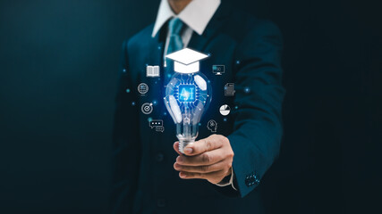 AI Learning Artificial Intelligence and Education Technology Concept, Businessman Holding Light...