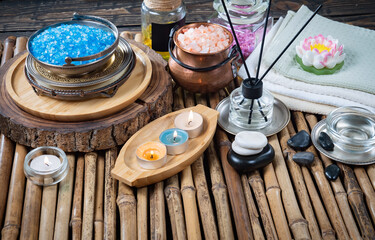 Spa massage items are arranged in a composition on the table.
