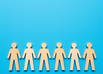 Wooden Human Figures in a Row on Blue Background Teamwork Concept Illustration