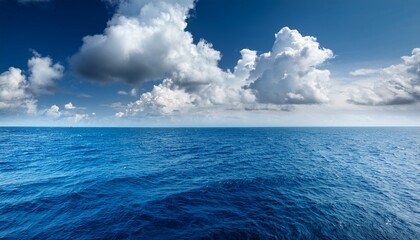 Obraz premium blue sea and clouds over it