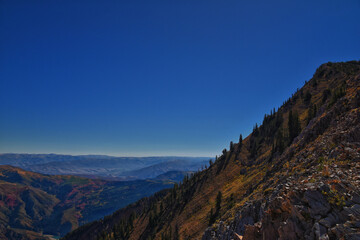 Box Elder Peak hiking views from trail, American Fork Canyon. Lone Peak, Mt Timpanogos, Wasatch Range Rocky Mountains, Utah, United States.