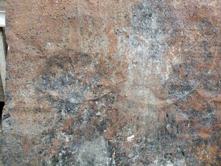 Weathered Rust and Corrosion on Metal Plate. Close-up of a heavily rusted and worn metal surface with textures of oxidation and peeling layers, ideal for grunge or industrial backgrounds