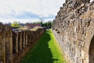 old stone wall and corridor at Byland Abbey - North York Moors - Byland - North Yorkshire - Great Britain