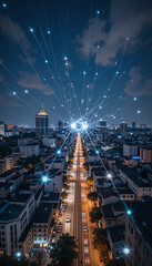 Fototapeta premium Dynamic cityscape at night with illuminated streets and star-like lights