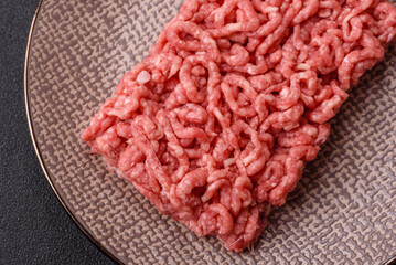 Stuffing or ground raw beef or pork with salt and spices