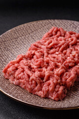 Stuffing or ground raw beef or pork with salt and spices