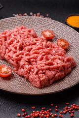 Stuffing or ground raw beef or pork with salt and spices