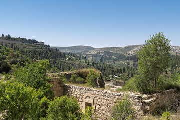 Lansdcape with a view from the ancient arabian abandoned village Lifta to the railway bridge near Jerusalem, Israel