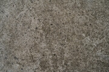 The photograph showcases an abstract wall texture in shades of gray with subtle patterns, offering an elegant and professional appearance. Perfect as a background for presentations, design projects