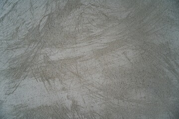 The photograph showcases an abstract wall texture in shades of gray with subtle patterns, offering an elegant and professional appearance. Perfect as a background for presentations, design projects