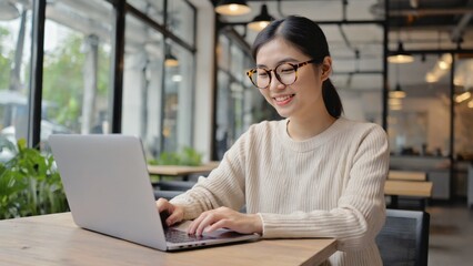 A person working on a laptop in a domestic setting