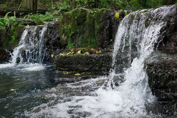 Fototapeta premium cascades of a clear brook