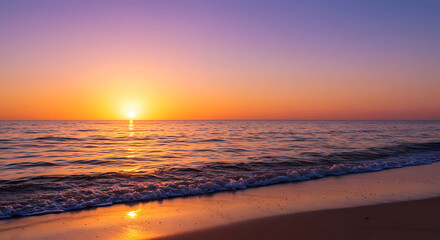Obraz premium Vibrant orange sun setting over calm ocean waves on a sandy beach, reflecting golden light, concept for summer vacation, travel promotion and tranquil escape