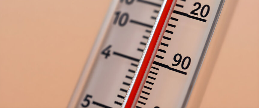 close up of a thermometer on a wall