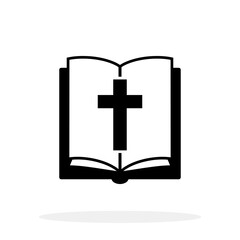Bible icon. Black closed Bible icon with white cross on the cover