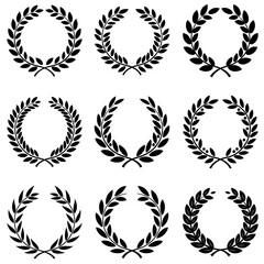 Laurel wreath icons. Black laurel wreath icons isolated on white background.