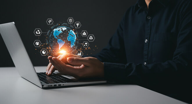 Business concept images, clear concept, valuable images  person using laptop with a digital globe and various icons floating above their hands and the keyboard