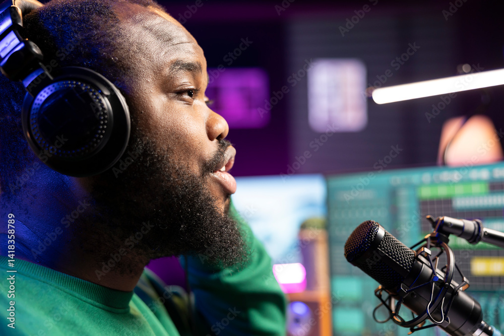 Poster talented musician expert singing a track on a microphone, performing in home studio to adjust volume