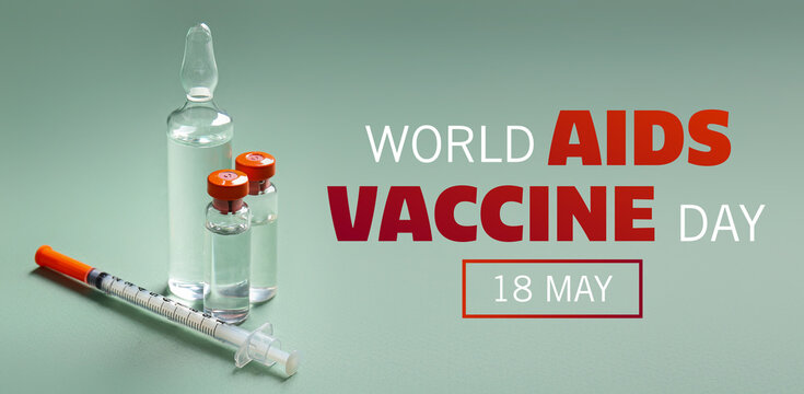 Medical ampules with syringe on green background