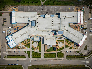 School building with a large parking lot