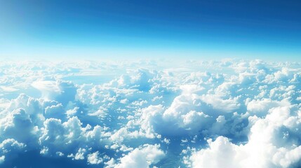 Beautiful fluffy clouds above clear blue sky