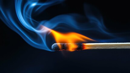 Close-up of a burning matchstick with smoke trails on a dark background.
