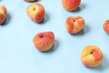 Sweet fig peaches on blue background