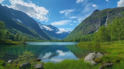 Fototapeta premium Picturesque landscape of a serene lake surrounded by mountains and forests.