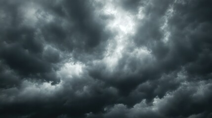Dramatic and ominous storm clouds fill the sky, hinting at impending rain.